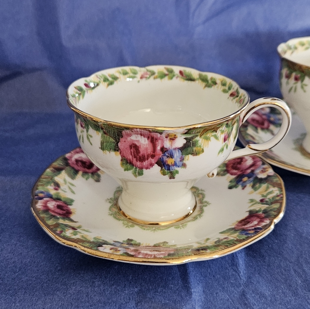 Two Demitasse "Tapestry Rose" cups and saucers.